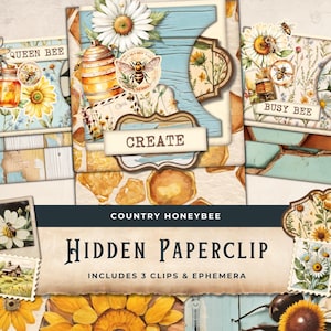May include: A collage of paper ephemera with a country honeybee theme. The design includes floral elements, bees, and the word "CREATE". The text "HIDDEN PAPERCLIP" and "INCLUDES 3 CLIPS & EPHEMERA" are also visible.
