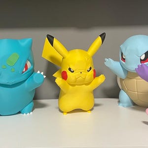 Raamdecoratie met een boze Eevee, Gengar, Charmander, Squirtle, Bulbasaur of Pikachu