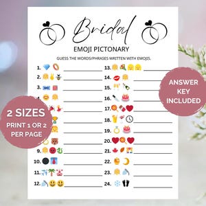 May include: A white paper game sheet with the title "Bridal Emoji Pictionary" and a series of numbered emoji-based clues. The sheet includes a pink circle with the text "Answer Key Included" and another pink circle with the text "2 Sizes Print 1 or 2 per page".