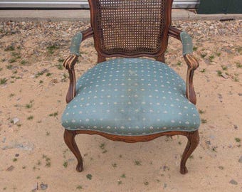 Vintage Victorian  French provincial style caned back arm chair with upholstered seat.