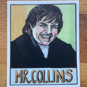 May include: A sticker featuring a cartoon illustration of a man with brown hair and a black jacket. The man is smiling and has a white collar. The sticker has a white background with a gold border and the text "MR. COLLINS" in gold letters.
