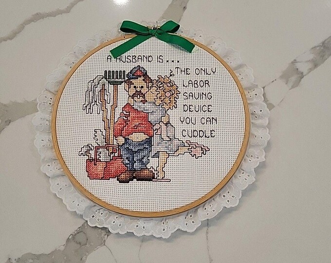 7.5" Vtg Hand Needlepoint Hoop Framed Art w/ Lace Trim "A Husband Is"... Kitschy