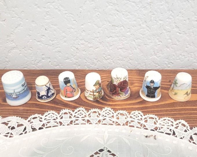 Lot of 7 Porcelain Thimbles Assorted places London Palm Springs San Diego Delft