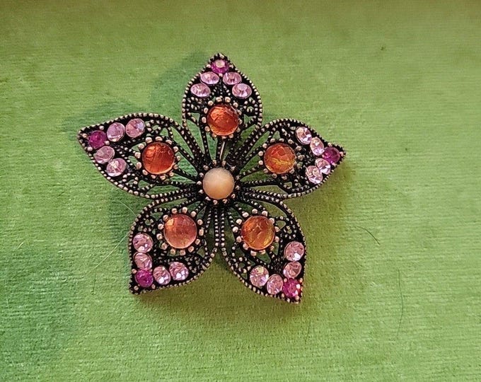 Vtg Style Flower Brooch pink & orange rhinestones set in a copper-toned filigree