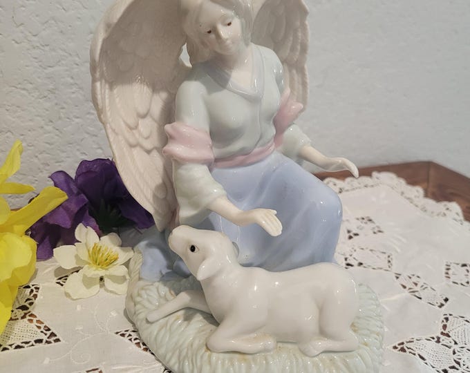 Porcelain Angel Figurine with Calf, Glossy Finish (6 X 6 X 4.5")