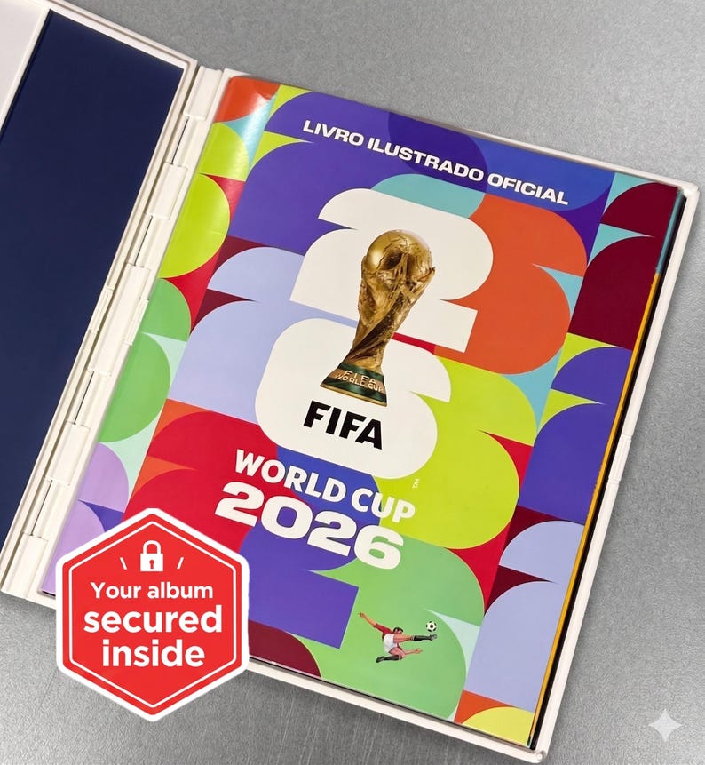 May include: The FIFA World Cup 2026 official sticker album features a colorful geometric pattern on the cover with the gold trophy, the text LIVRO ILUSTRADO OFICIAL, and a red hexagonal badge that reads Your album secured inside.