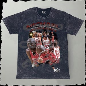 May include: A black t-shirt with a faded, vintage look featuring a collage of Michael Jordan images in red and white Bulls jerseys. The text "MICHAEL JORDAN" is printed in white on the shirt.