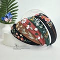 Hand Embroidered Linen Headband: Floral Bachelorette Hair Accessory product logo