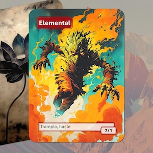 Op de afbeelding: Twee fantasy art kaarten. Eén kaart toont een zwarte lotusbloem. De andere kaart toont een vurige elementaire wezen met het woord "Elemental" bovenaan en "Trample, haste" onderaan. Het wezen is omringd door oranje en gele vlammen.