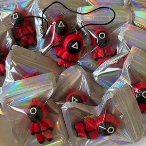 squied game rubber keychain fun and fearless