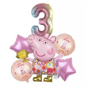 May include: Pink Peppa Pig balloon with a gold trophy, surrounded by pink star balloons and a pink balloon with the text "My Fantastic Golden Miles". A large iridescent pink number 3 balloon is at the top.