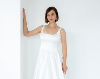 Sweetheart Satin A-Line Wedding Gown: Minimalist Open Back Bridal Dress