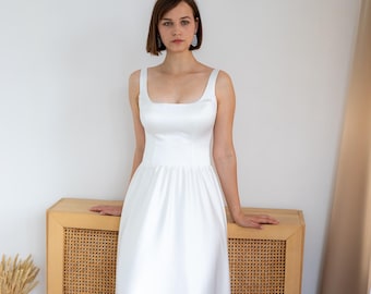 Satin A-Line Wedding Dress: Minimalist Sleeveless Bridal Gown