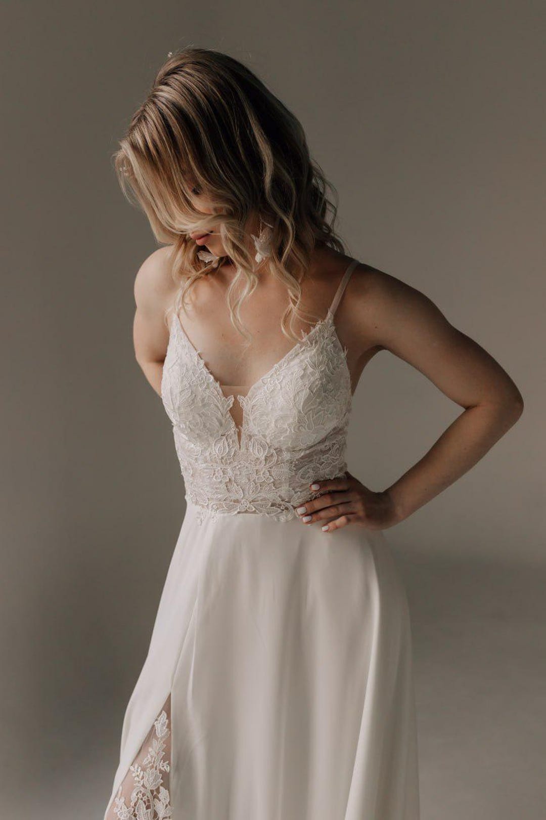 low cut wedding dress Fit and Flare with Low-Cut Back Designed for brides seeking effortless elegance V-Back Wedding Dresses | Sophia
