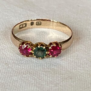Antique  Ruby and Green Paste Trilogy Ring set in 9ct Rose Gold.