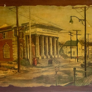 May include: An oil painting depicts a street scene with a United States Post Office building. The building has large columns and the words "UNITED STATES POST OFFICE" are visible. A red mailbox and streetlights are also present. The painting has a vintage feel.