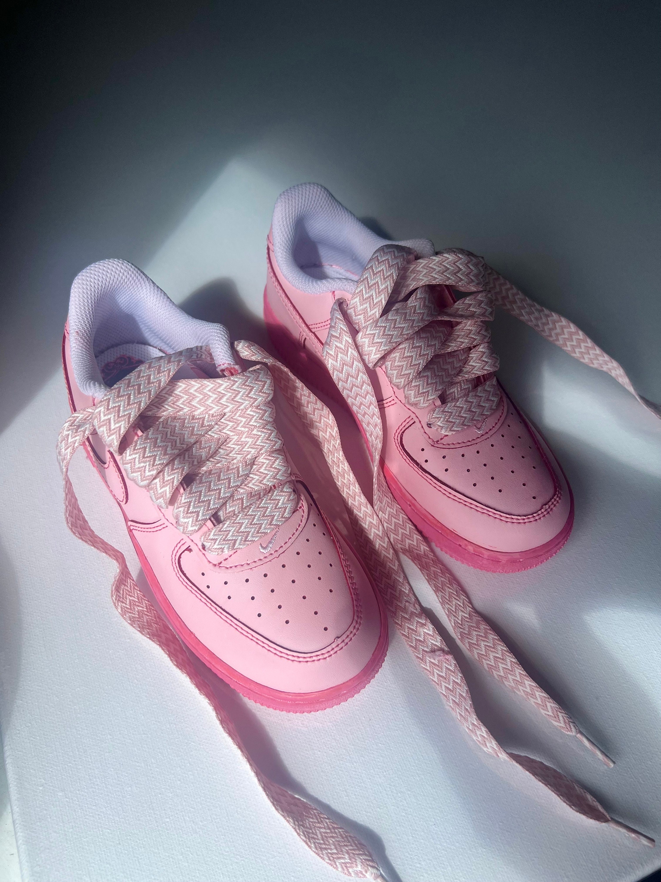 light pink nike air force 1 high top