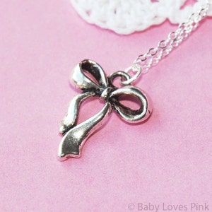 Sterling Silver And Glittered Bow Necklace 001-605-00190