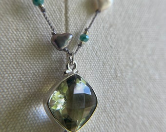 Beautiful faceted green Amethyst in Sterling hand knotted necklace