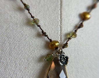 Smoky Topaz in gold pendant with golden freshwater pearls.