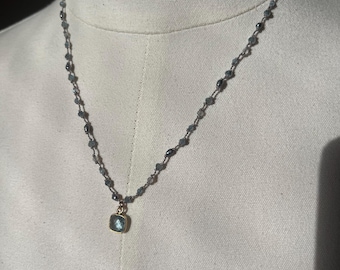 Square shaped blue topaz, crystal in gold plated, setting with labradorite, Peacock, pearls and blue zircon and crystals.