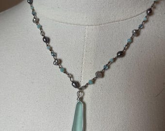 Beach glass pendant, handknotted on a polymer nylon with peacock pearls, champagne, pearls, aquamarine, Peruvian opal, labradorite