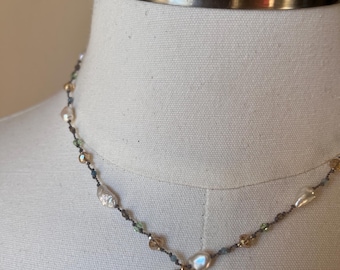 Hand woven pearl necklace with gold filled pendant, Keshi pearls, blue gemstones, light yellow and green crystals, and gray Labradorite