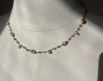 Floater necklace with champagne and pale, green freshwater, pearls, Amazon, light and cream and blue crystals. 17 inches. Very pretty.