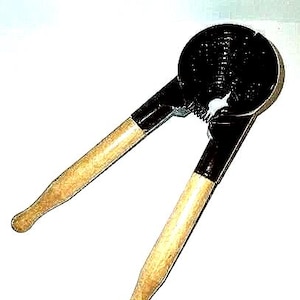 Vintage Brown Metal Nutcracker/ Lemon Squeezer