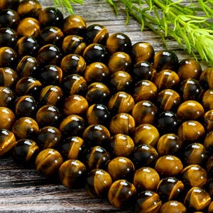 Guaranteed 100% natural AAA Tiger&#39;s Eye Round Beads - Stunning Chatoyant Swirls - 4MM 6MM 8MM 10MM 12MM Multiple Sizes 15.5&quot; Strand