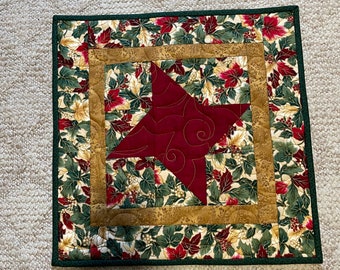 Christmas Square Star Table Topper in Reds. Golds, and Greens