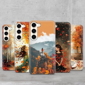 May include: Four different phone cases with autumn-themed designs. Each case features a different scene with trees, leaves, and a woman in a forest setting. The cases are all white with a clear back and a black camera bump.