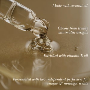 May include: A close-up shot of a glass dropper dispensing a golden liquid. Text on the image reads: "Made with coconut oil," "Choose from trendy minimalist designs," "Enriched with vitamin E oil," and "Formulated with two independent perfumers for unique & nostalgic scents."