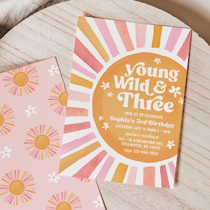 May include: A colourful invitation with a sunburst design in shades of pink, orange, and yellow. The text reads "Young Wild & Three" and includes details for a birthday party.