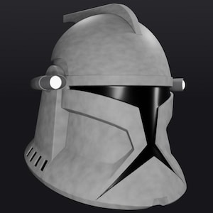 May include: A grey, textured helmet with a black visor, similar to a clone trooper's helmet. The helmet has a distinctive fin on top, side lights, and ventilation slits. The design is a 3D render.