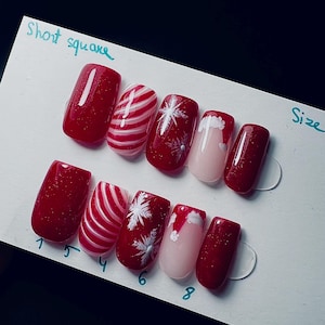 Uñas de Papá Noel Uñas navideñas Uñas de copo de nieve Uñas rojas Uñas festivas Uñas navideñas Uñas lindas con brillo Uñas premium Uñas de gel de calidad de salón