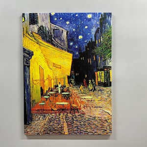 May include: A painting of a cafe at night with a starry sky. The cafe is lit up with yellow lights and there are people sitting at tables outside. The painting is done in a style similar to Vincent van Gogh.