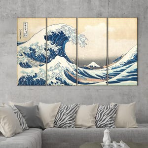 May include: A multi-panel artwork depicting a large ocean wave in shades of blue and white, with a mountain in the background. The artwork is a classic Japanese woodblock print, with boats and text visible.