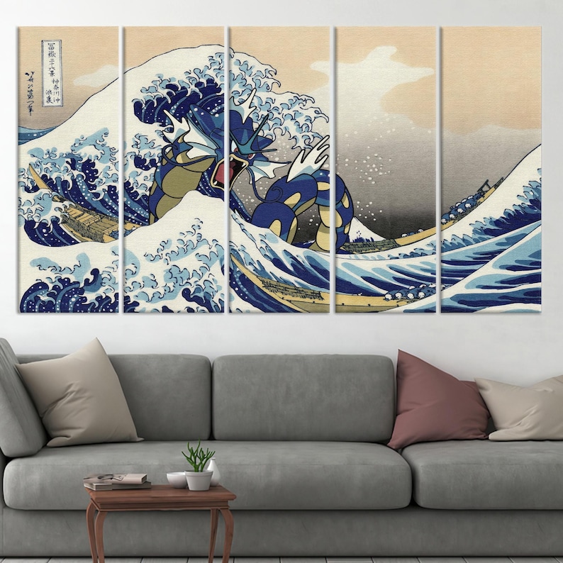 May include: A multi-panel canvas print featuring a blue and yellow wave with a blue and green Pokemon character emerging from the wave. The wave is reminiscent of the Great Wave off Kanagawa by Hokusai.