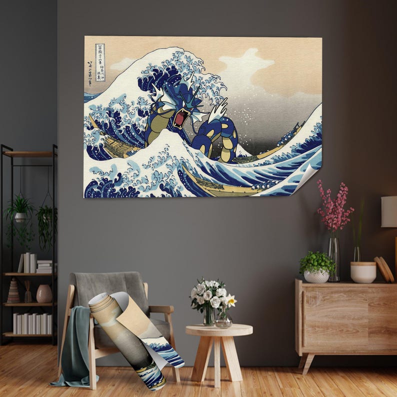 May include: A blue and yellow Pokemon character, resembling a dragon, emerges from a large wave in a Japanese-style woodblock print. The wave is blue and white with splashes of yellow and white foam.