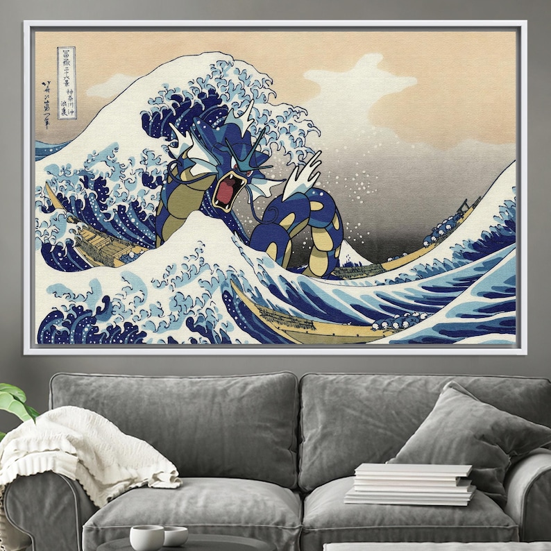 May include: A blue and yellow Pokemon, resembling a dragon, emerges from a large, crashing wave in a Japanese-style art print. The wave is depicted in shades of blue and white, with a background of light orange and gray. The text in the upper left corner reads "神奈川沖浪裏" in Japanese.