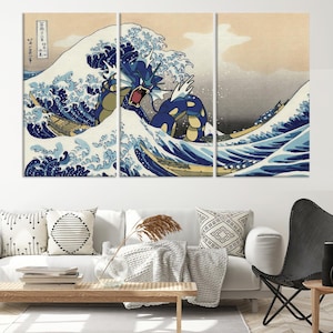 May include: A three-panel canvas print featuring a blue and yellow Pokemon character emerging from a large wave, inspired by the famous Japanese woodblock print "The Great Wave off Kanagawa".