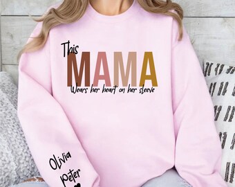 This Mama Wears Her Heart Her Sleeve Sweatshirt, Custom Kid Name, Personalized Mom Sweater, Gift For Mom,Mothers Day Gift,Mothers Day Hoodie