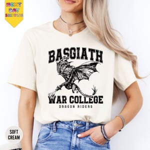a woman wearing a t - shirt with a dragon on it