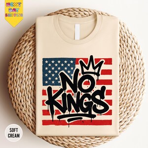 a t - shirt with the words no kings on it