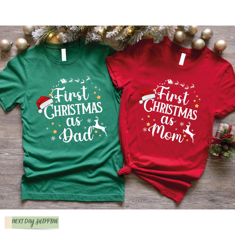 two t - shirts that say first christmas as a mom and first christmas as a