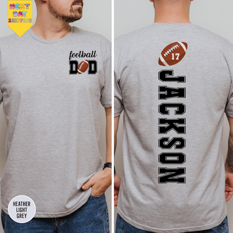 a man wearing a gray shirt with a football on it