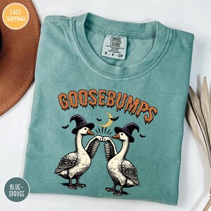 a t - shirt with goose bumps on it