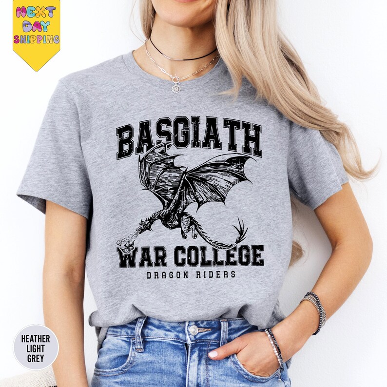 a woman wearing a baseball shirt with a dragon on it