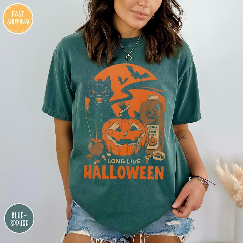 a woman wearing a green halloween t - shirt